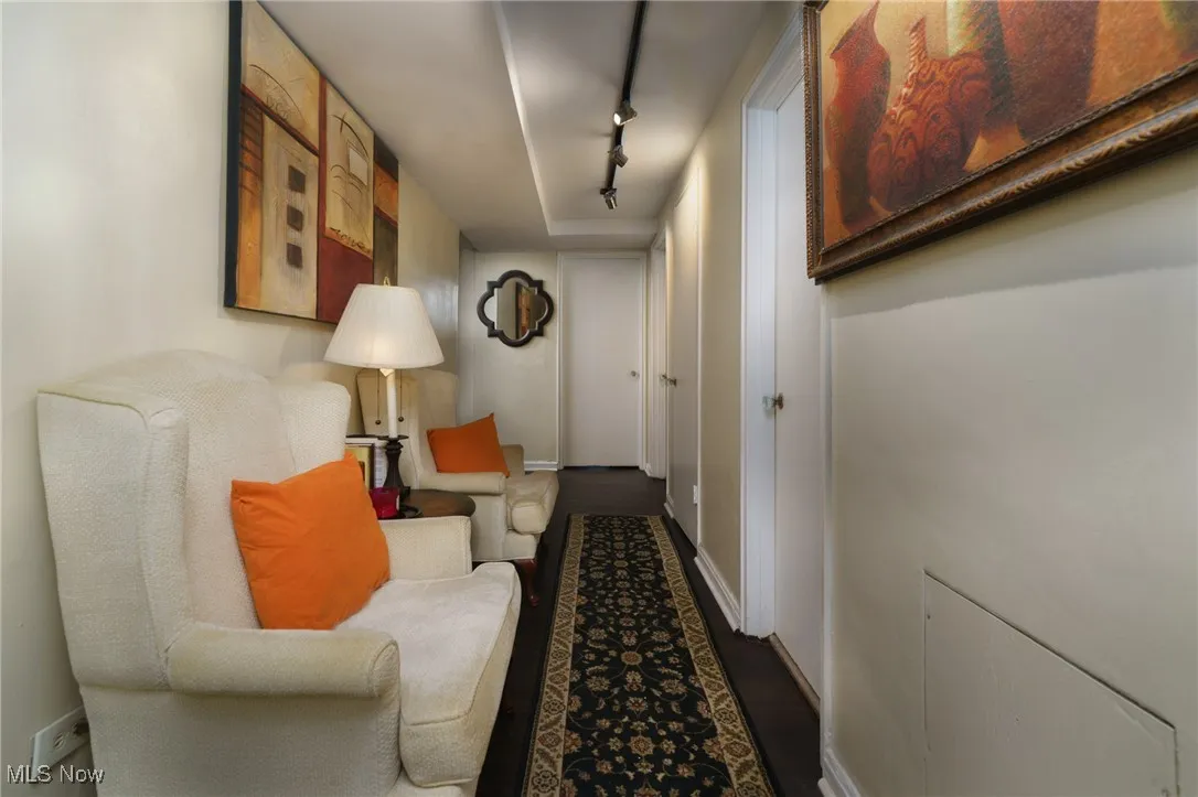 Corridor featuring baseboards