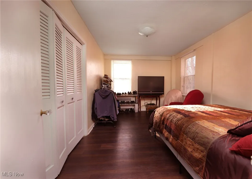 Bedroom featuring a closet and wood finished floors