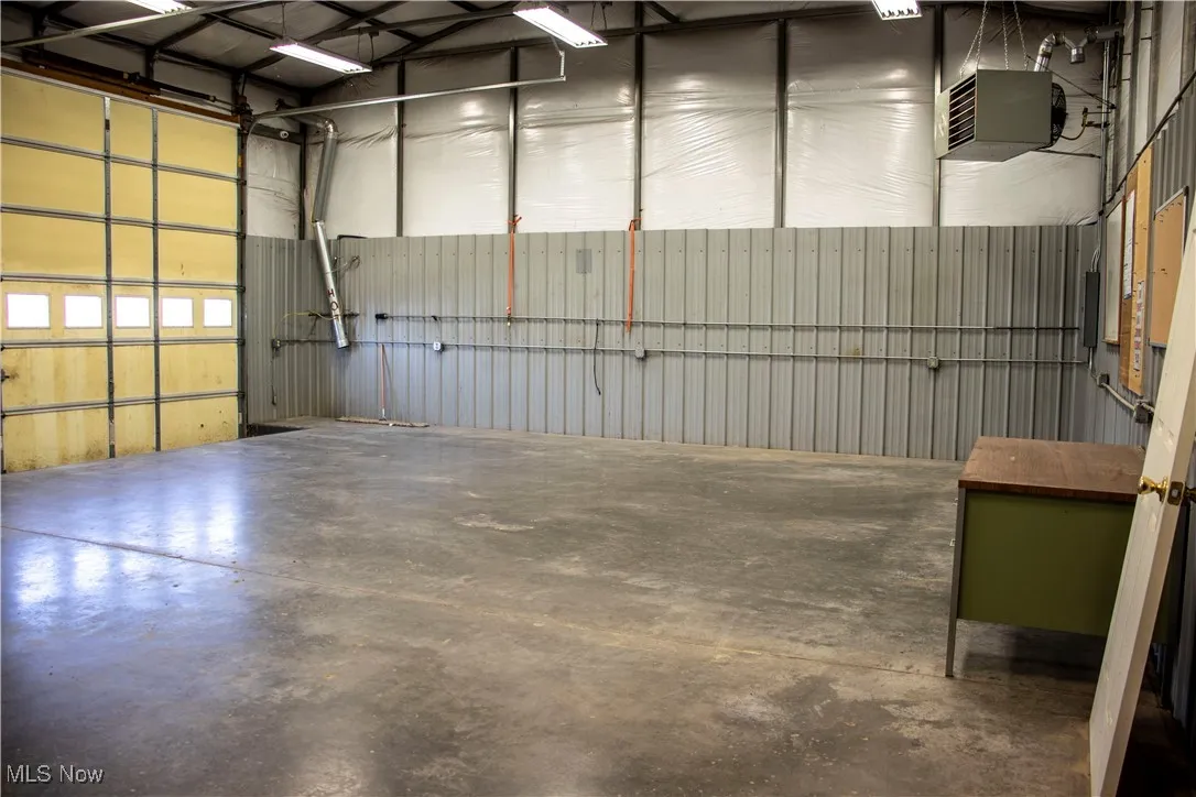 2 delivery bay garage doors and shipping room