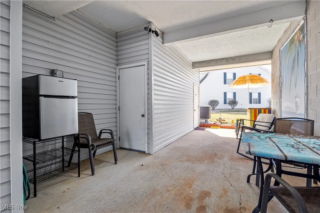 View of patio / terrace with central AC unit