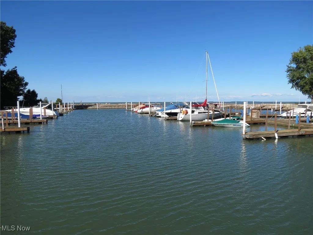 Property view of water featuring a floating dock