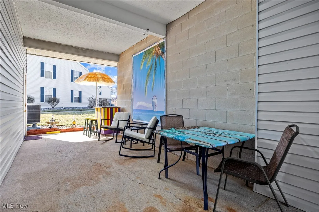 View of patio featuring central AC