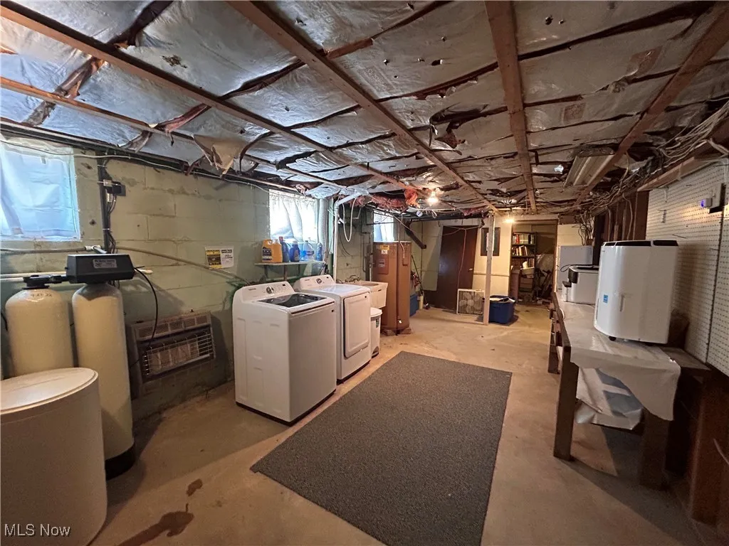 Below grade area with independent washer and dryer