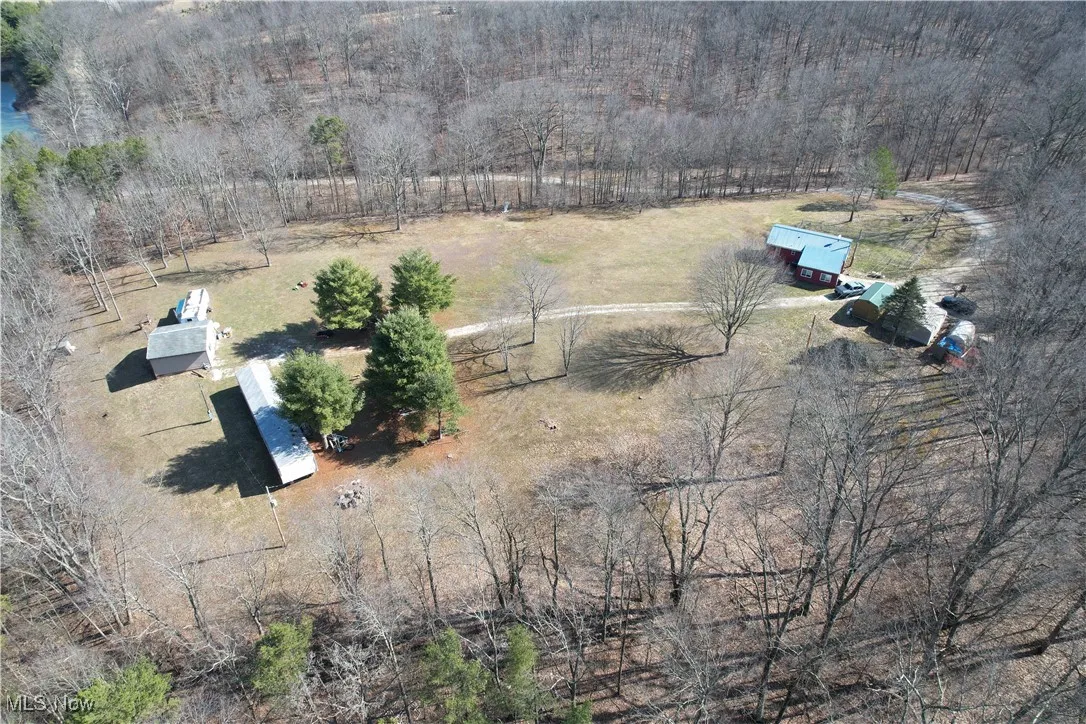 Birds eye view of property featuring a rural view