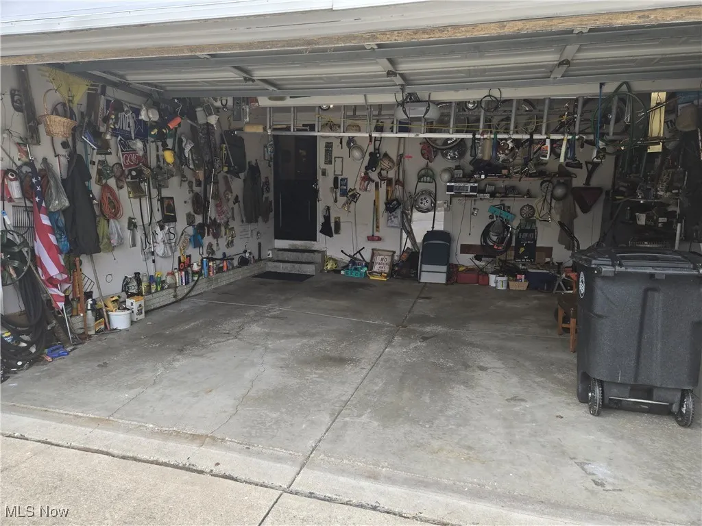 Garage featuring a workshop area