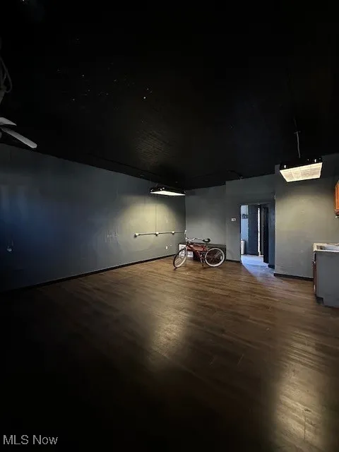 Spare room with ceiling fan and wood finished floors