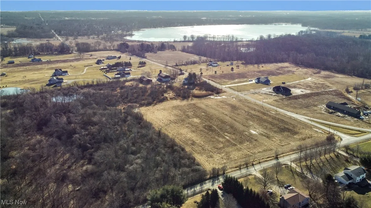 Drone / aerial view with a rural view and a water view