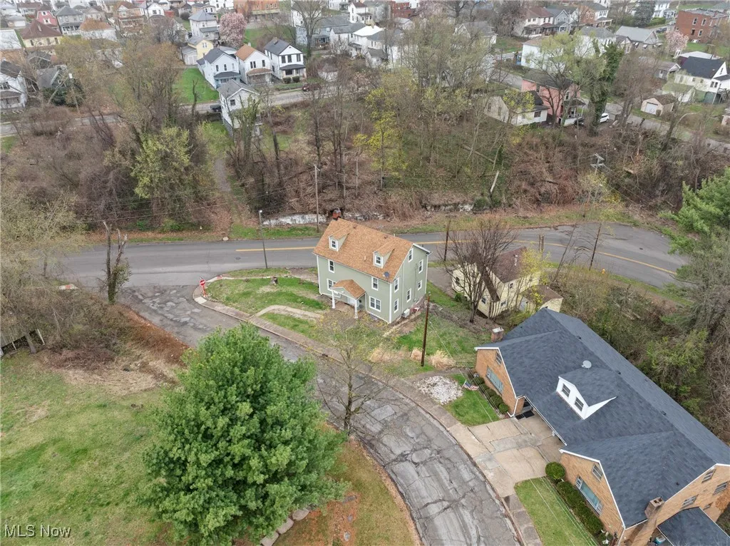 Birds eye view of property with a residential view