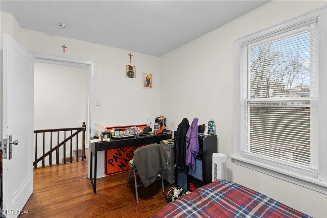 Bedroom featuring wood finished floors