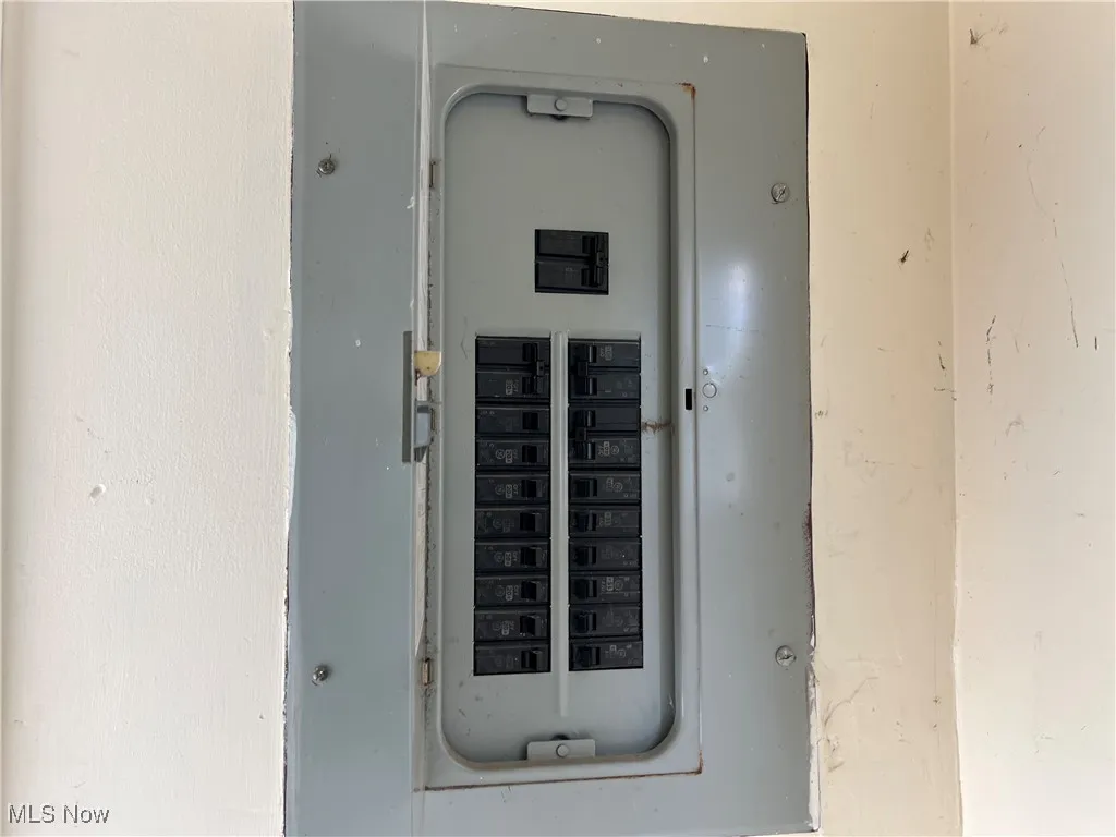 Utility room featuring electric panel