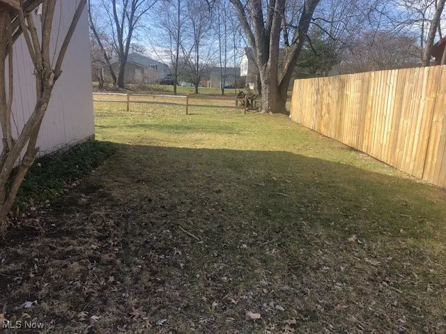 View of side yard with fence
