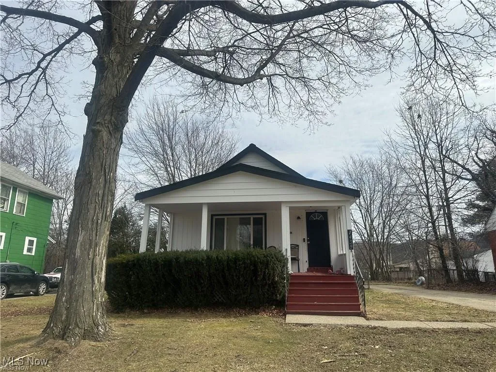 Bungalow-style home with a porch