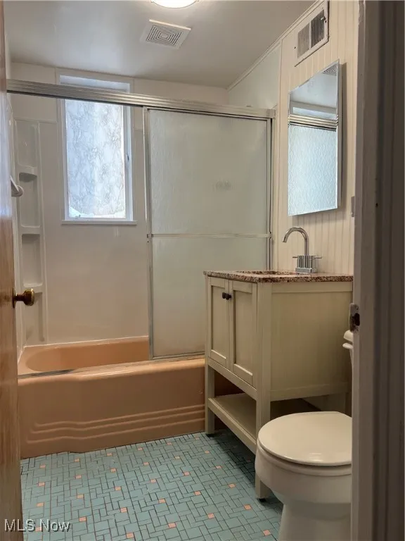 New vanity, tub surround, medicine cabinet and ventilation fan.