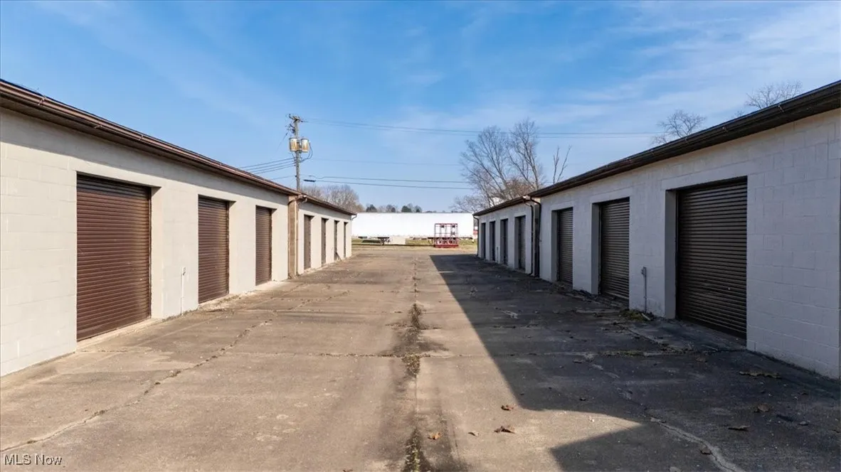 View of street driveways and garages