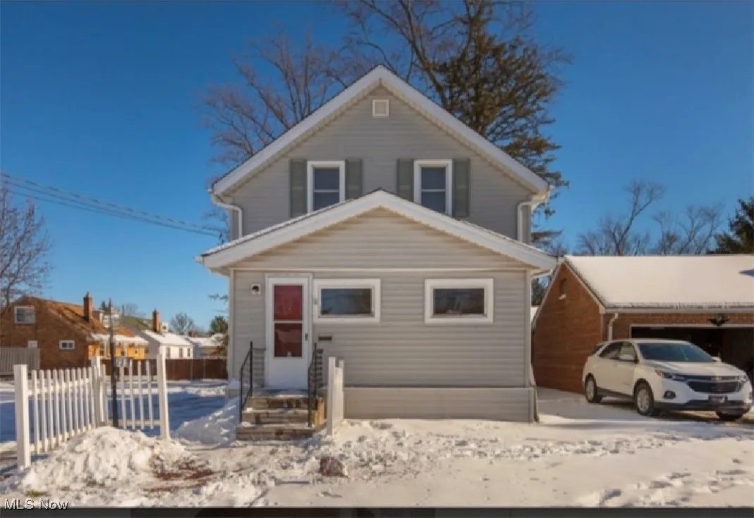 View of front of home with fence