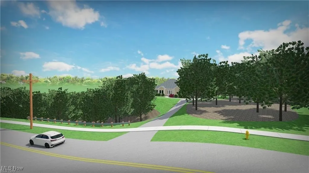 View of property's community with a yard