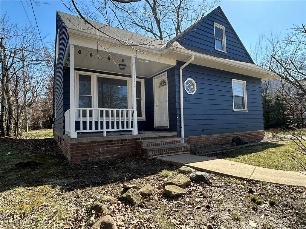 Bungalow-style house featuring a porch