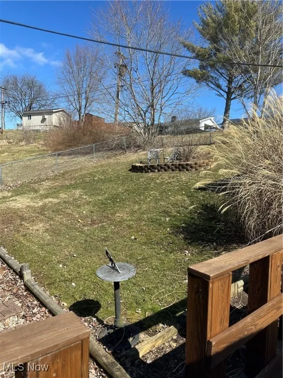 View of yard with fence