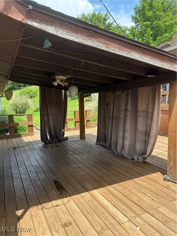 View of covered porch and deck
