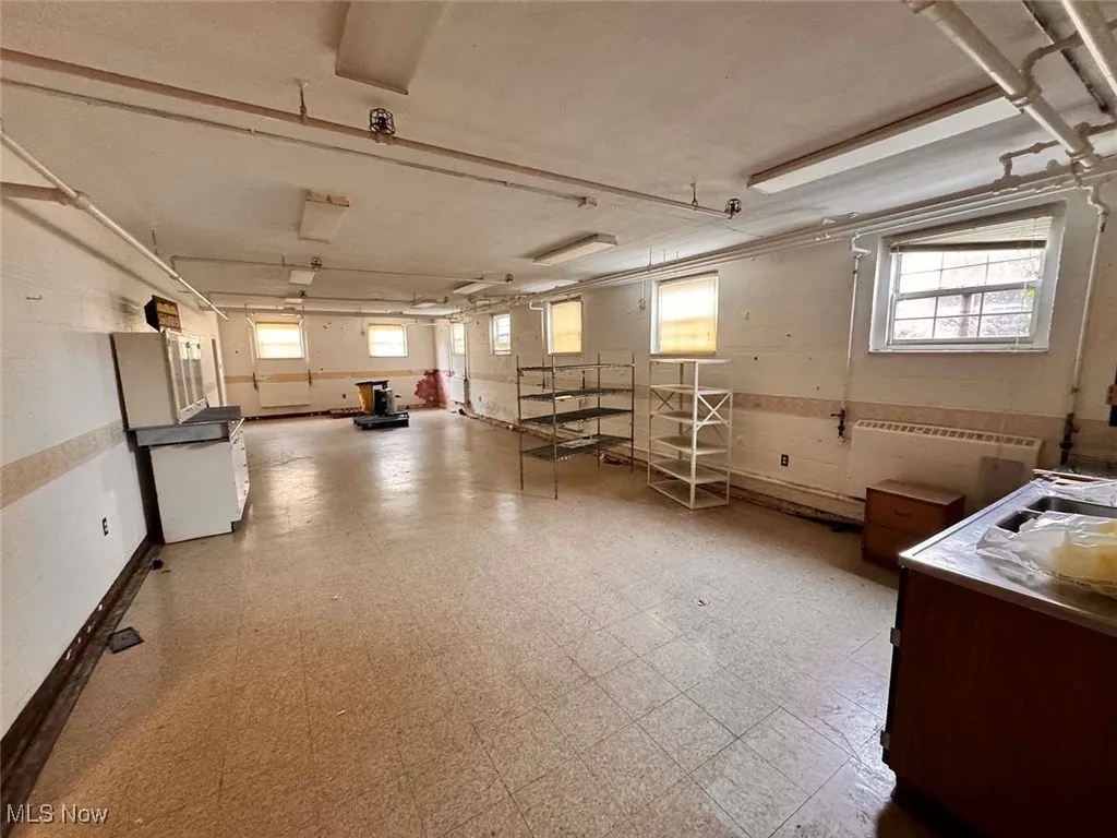 Basement featuring tile patterned floors