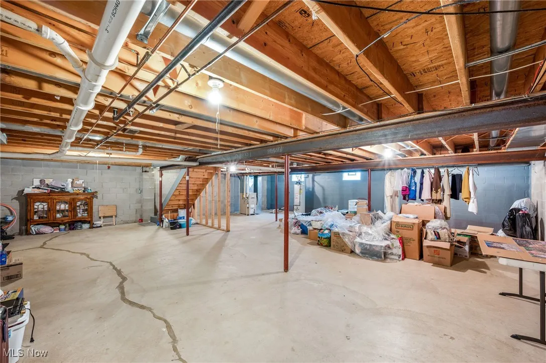 Unfinished below grade area with stairs