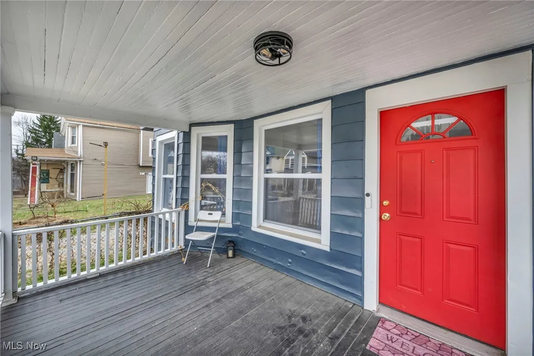 Entrance to property with covered porch