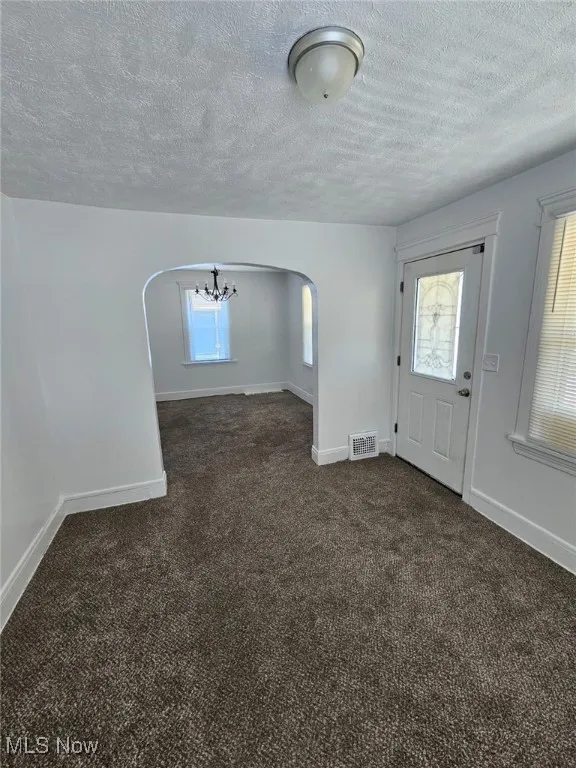 Living room view into dining room