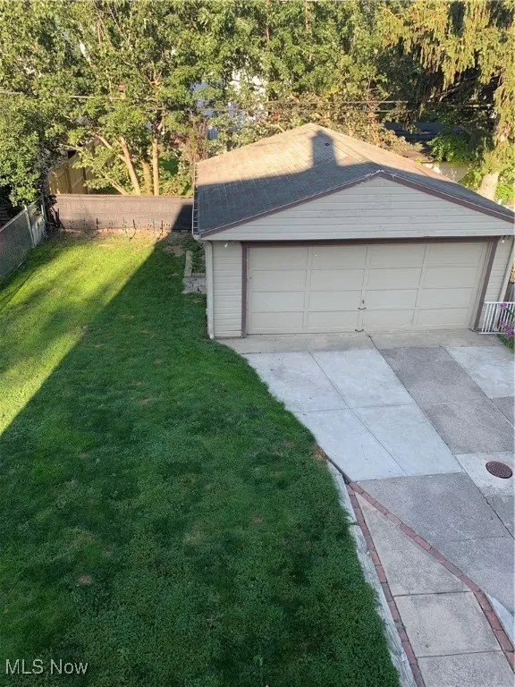 Detached garage with fence