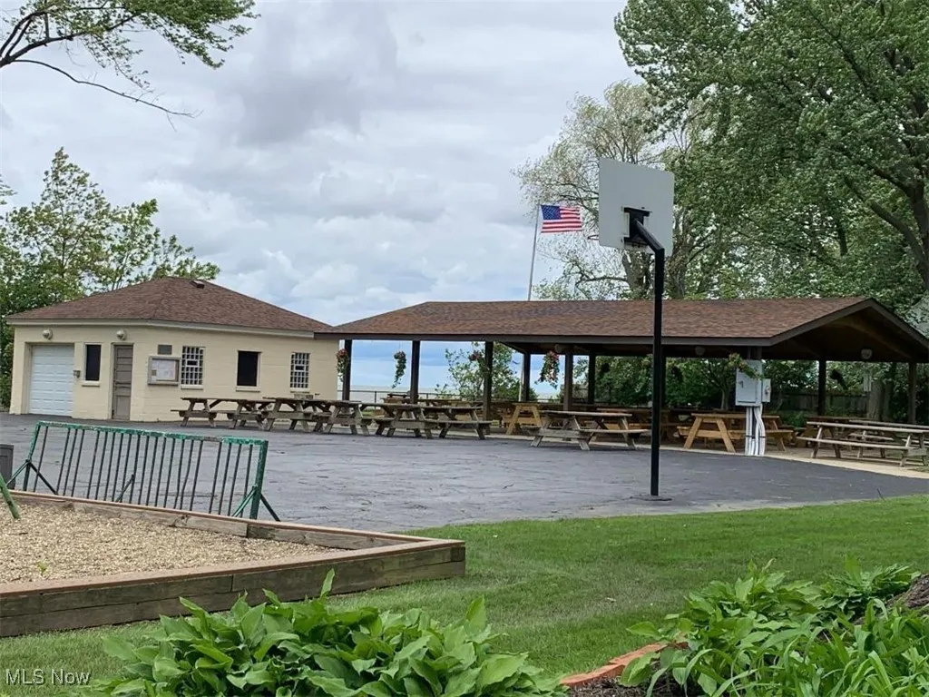 View of property's community featuring a gazebo and a yard