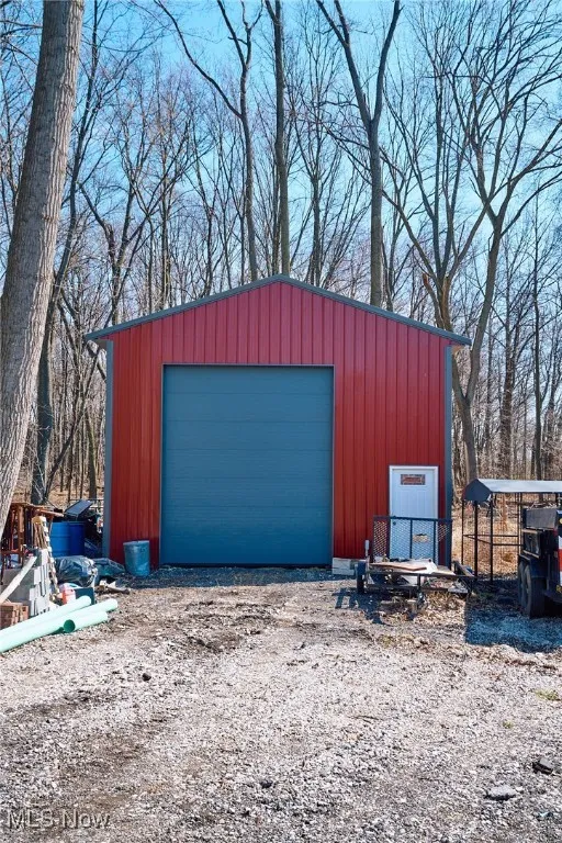Detached garage with driveway