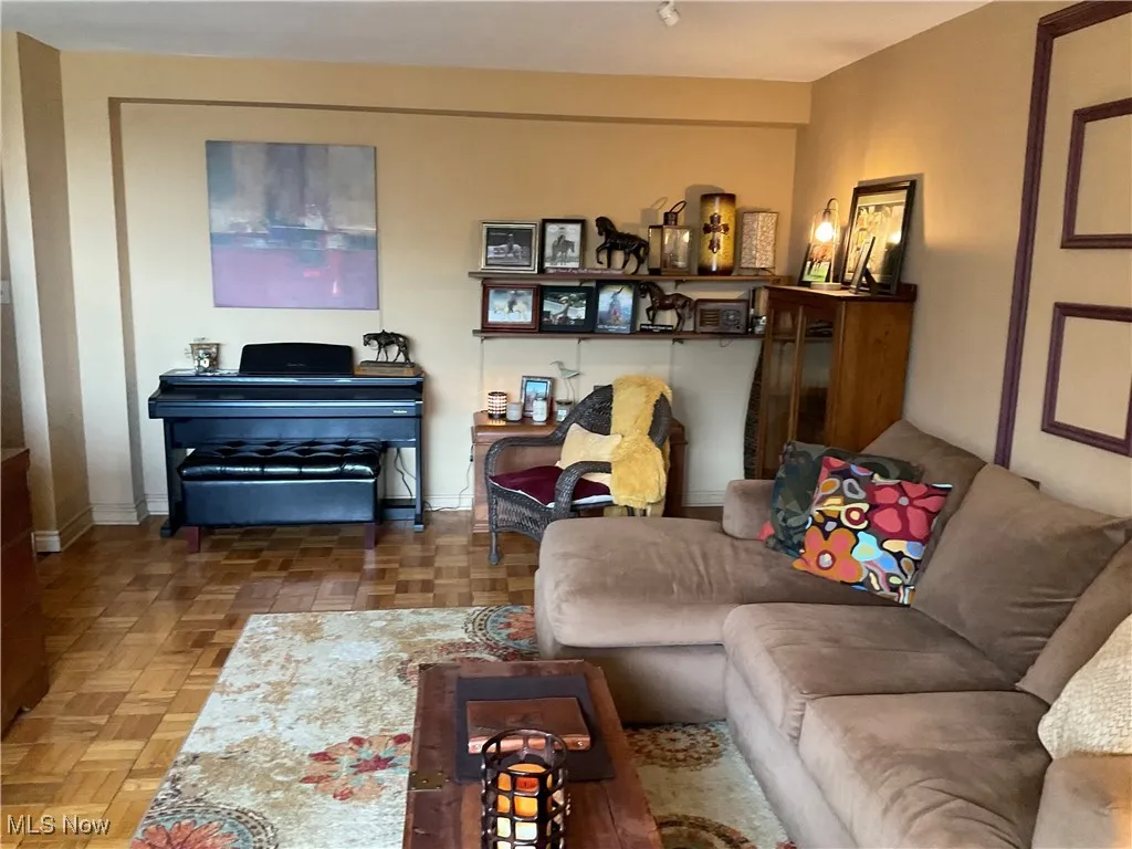 Living area featuring baseboards