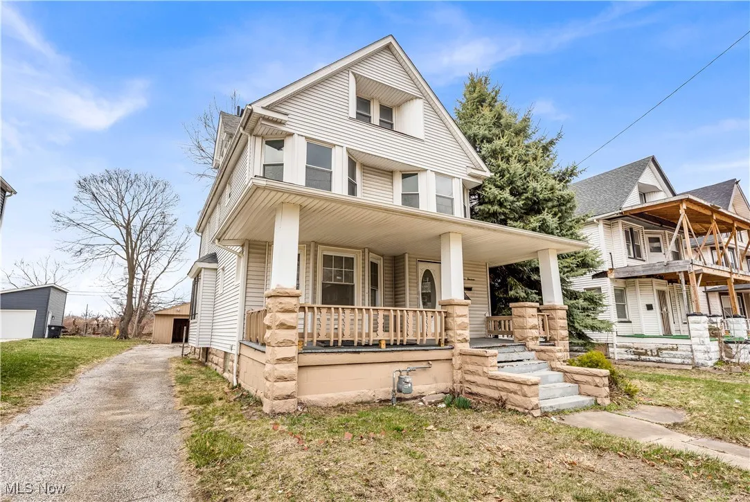 Traditional style home with a porch