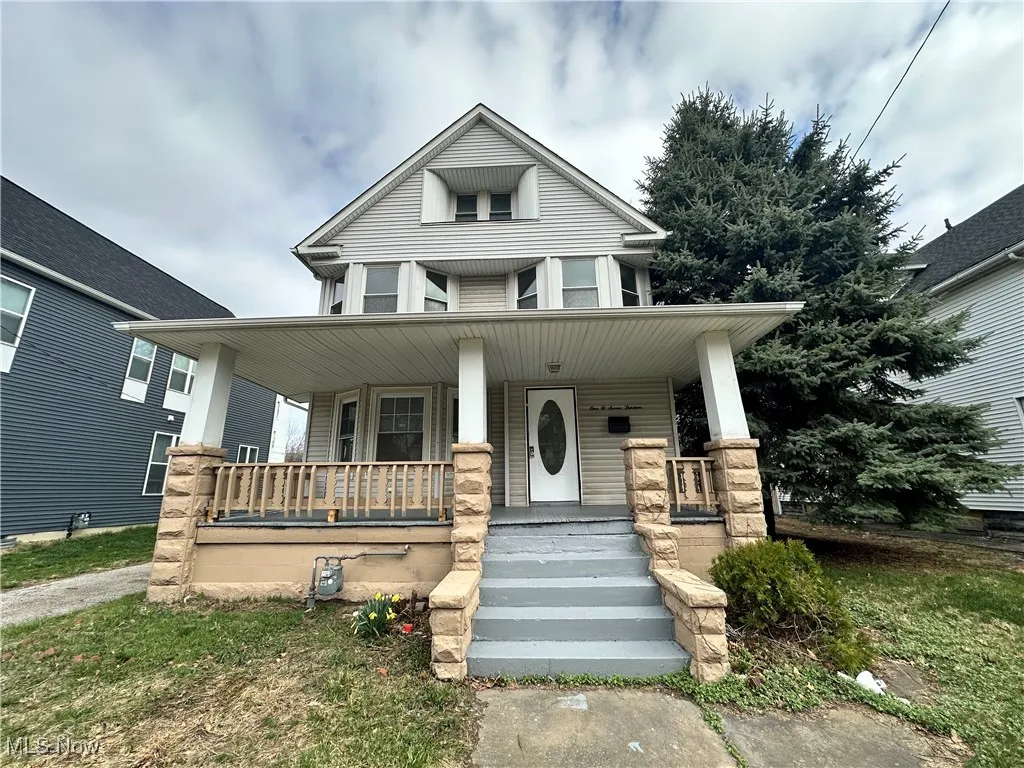 View of front of property with a porch