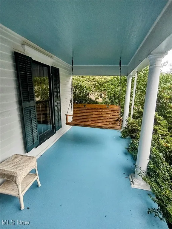 View of patio / terrace featuring a porch