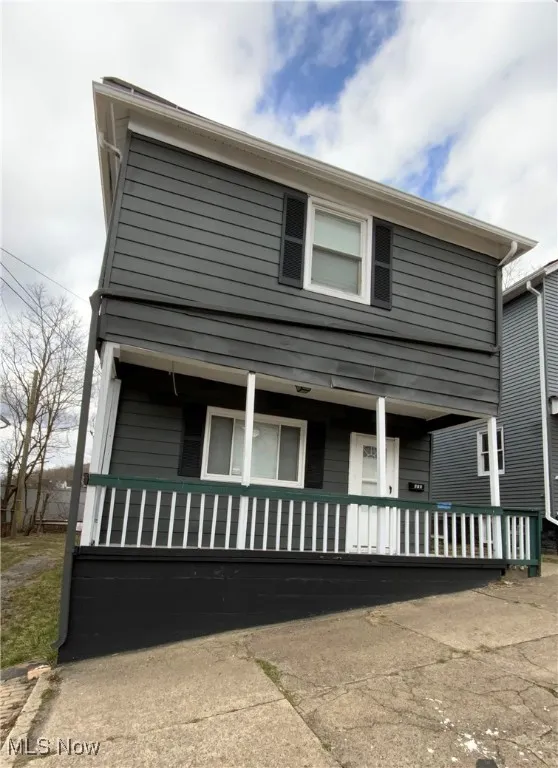 View of front of home with covered porch
