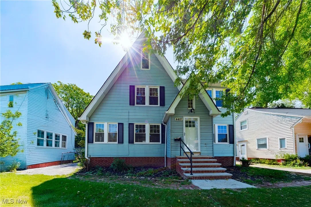 Bungalow-style home featuring a front lawn