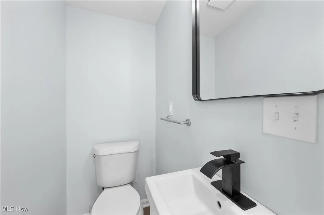 Bathroom featuring toilet and a sink