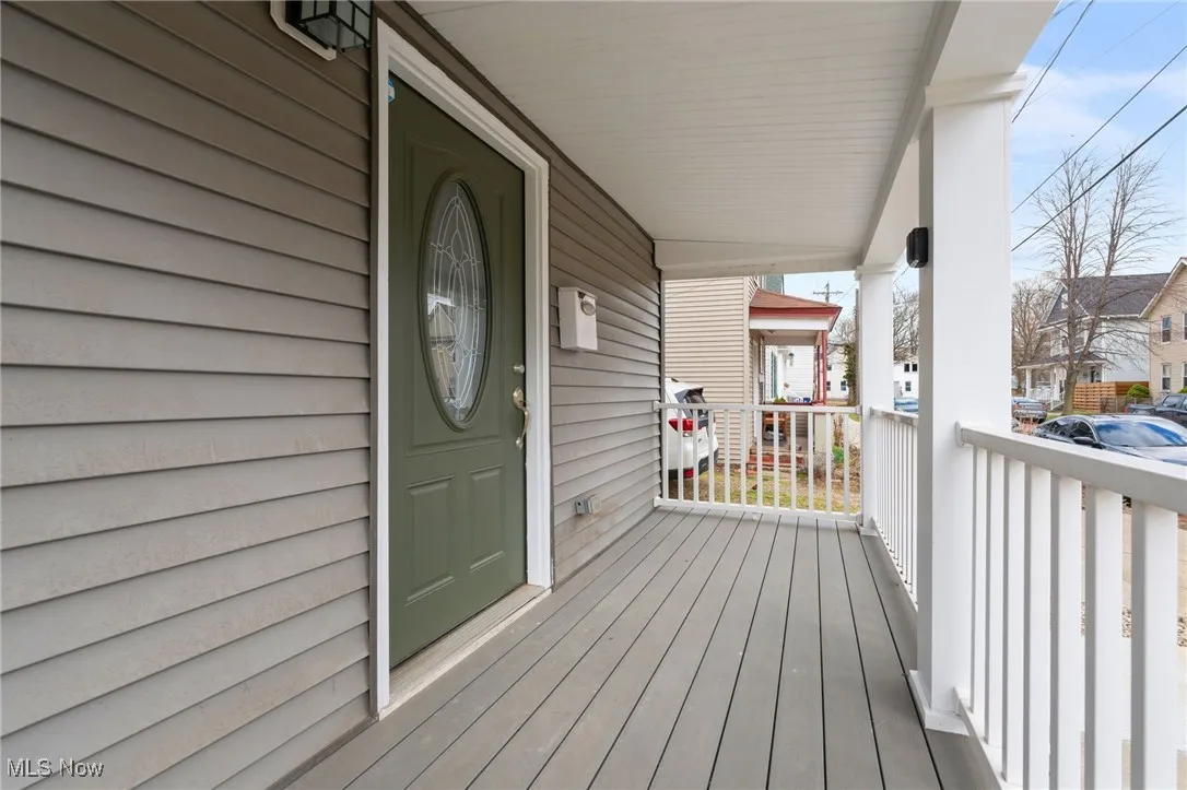 Wooden deck featuring a porch