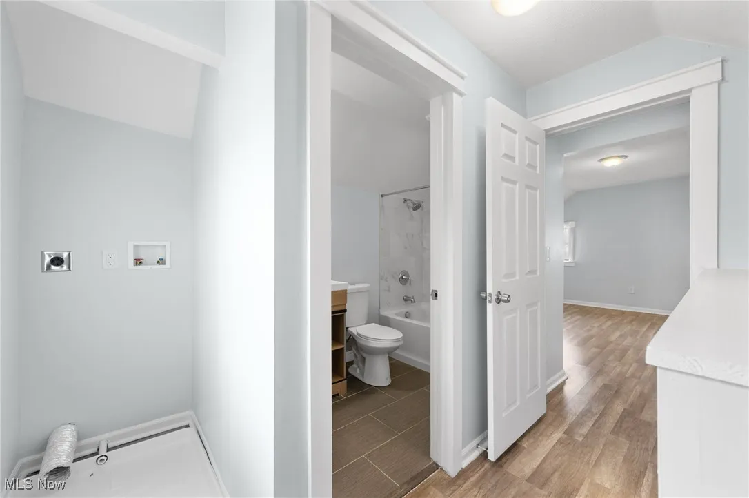 Bathroom featuring bathtub / shower combination,  vanity