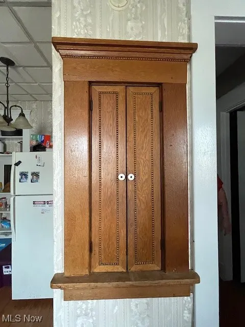 Room details featuring refrigerator