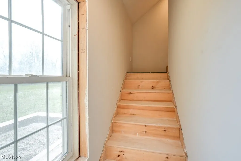 Separate stairway to bonus room from the garage.