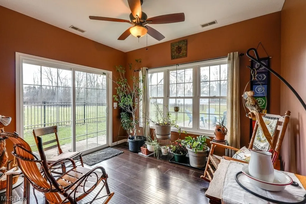 Walks out to fenced in yard and patio area.