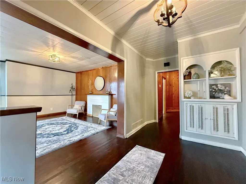 Entry opens to Sitting Room and inviting Foyer