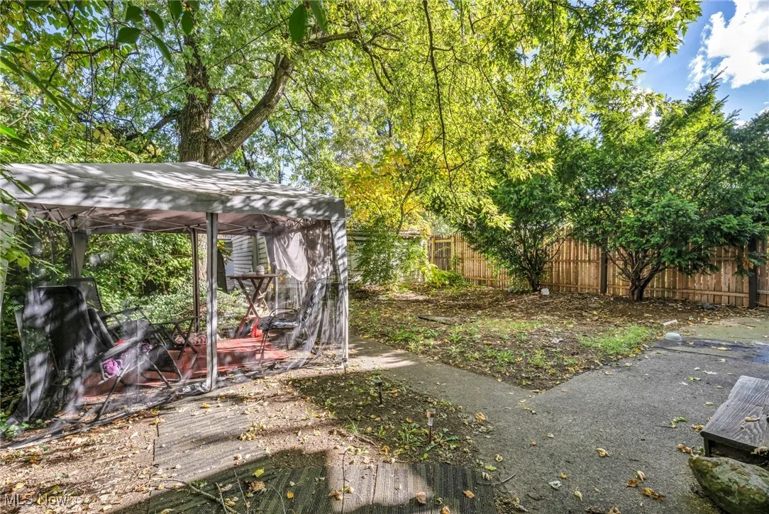 View of yard featuring fence