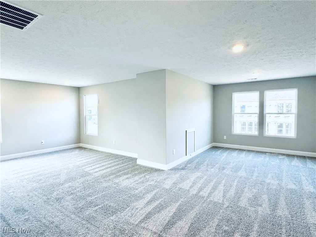 Second level also includes a guest bedroom and full bathroom