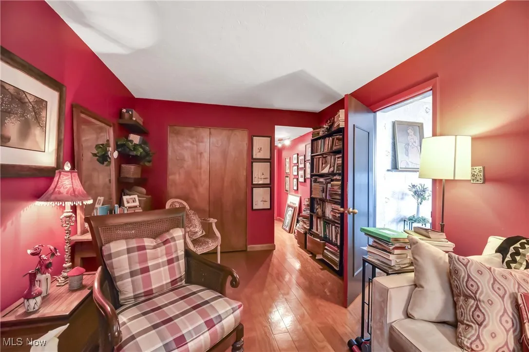 hardwood / wood-style flooring and a wealth of natural light