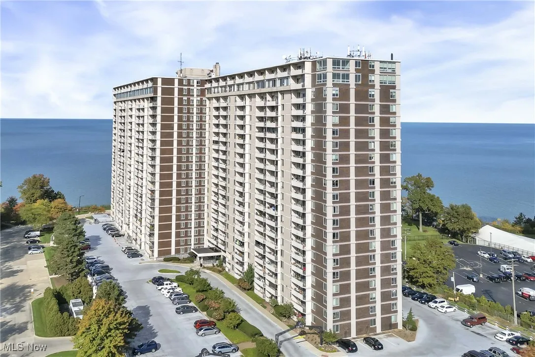 View of building exterior featuring a water view