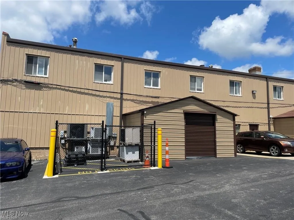 Multi unit property with a gate and fence