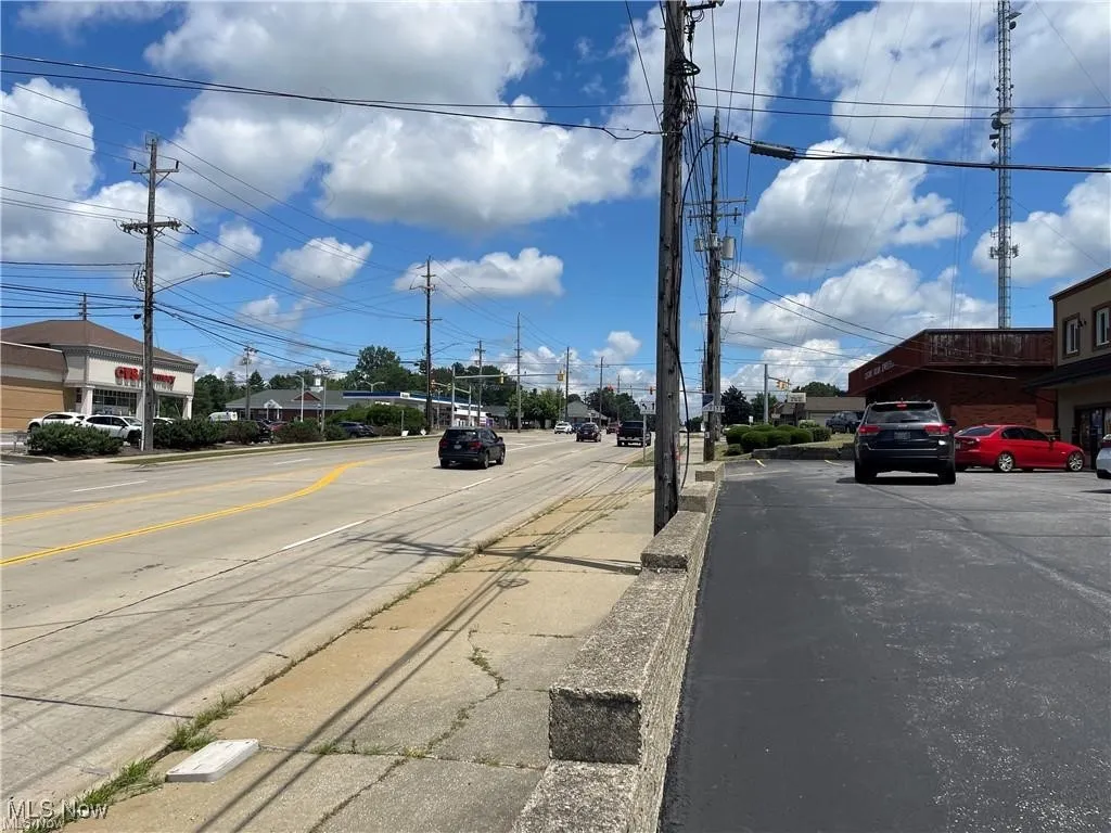 View of street featuring curbs and sidewalks