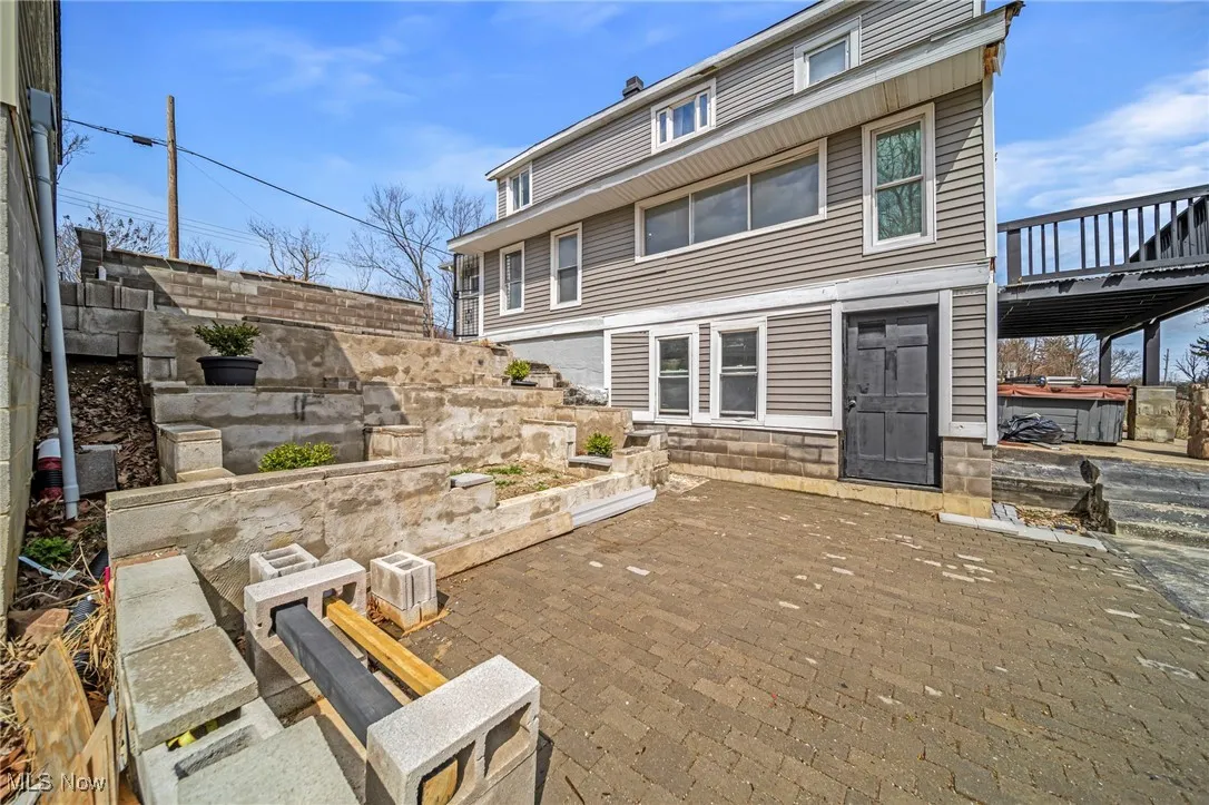 Back of property featuring a patio area